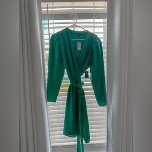 Wrap around dress. Brand is Express. Never worn has tag. Size Large